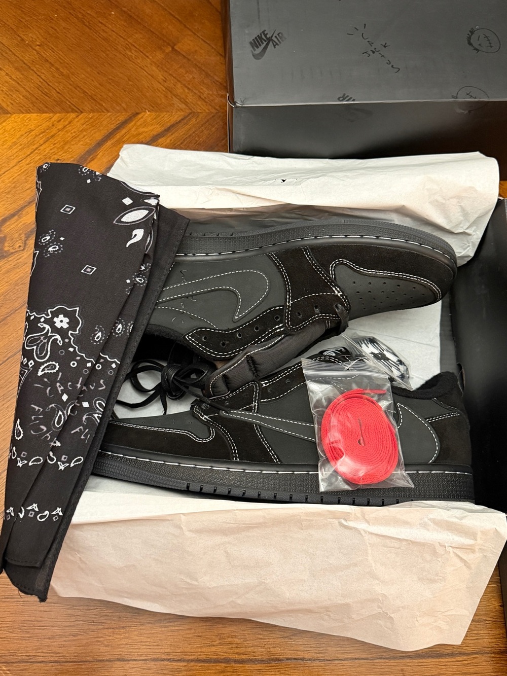 Nike Black/Grey Low-Top Sneakers with Red Lace Accent